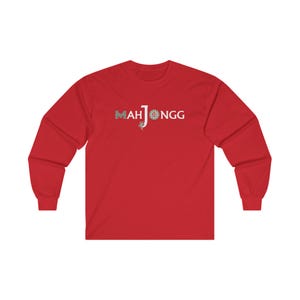 May include: Red long-sleeved t-shirt with white text that reads "MAH JONGG".
