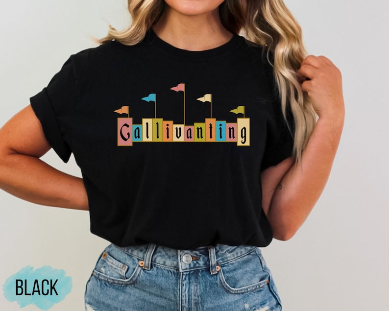 May include: Black t-shirt with a graphic of colorful flags and the word "Gallivanting" in a vintage font.
