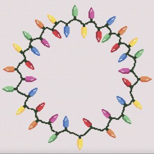 May include: A string of colorful Christmas lights in a circle shape, with a white background.