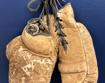 Antique child’s leather boxing gloves
