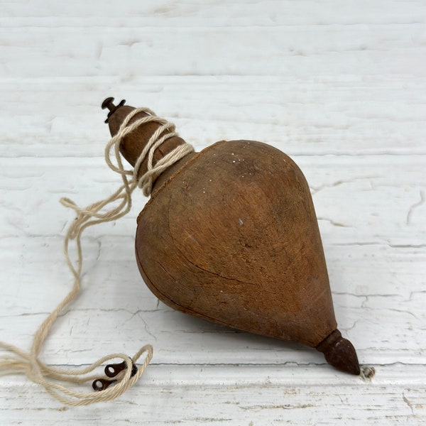 vintage wooden spinning top with string