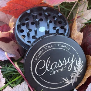 2.5” Matte Black Stainless Steel Grinder Herb 4 chamber w/ Kief Catcher incl Cleaning Accessories,Poker Tool and Botanical Art Storage Box