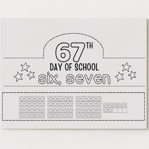 May include: A white rectangular sign with black text and illustrations. The text reads "67th DAY OF SCHOOL" and "six, seven". There are star illustrations and a grid of stars at the bottom. The sign is likely for educational purposes.