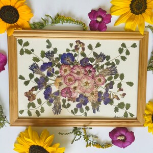 Beautiful pressed rose flowers in picture frames (made from real natural, dried flowers).