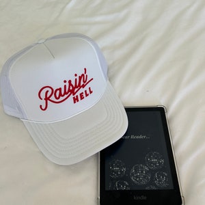 Raisin’ Hell Trucker Hat