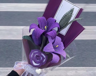 May include: A bouquet of purple crocheted flowers with green leaves, wrapped in a clear plastic bag with a purple ribbon and a white tag that says "Good vibes, good times, good memories".
