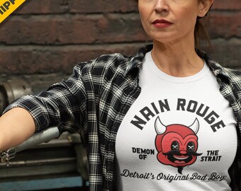 Our original Detroit Nain Rouge character t-shirt featuring an icon of legendary Detroit folklore! Great gift Michigan history