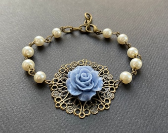 Pearl bracelet with a blue rose pendant, floral bracelet, nature jewelry, gifts for her, romantic jewelry, woodland bracelet