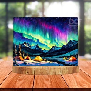 May include: A digital painting of a mountain landscape with a vibrant aurora borealis in the sky.  There are several orange and yellow tents set up in the snow, suggesting a camping trip.