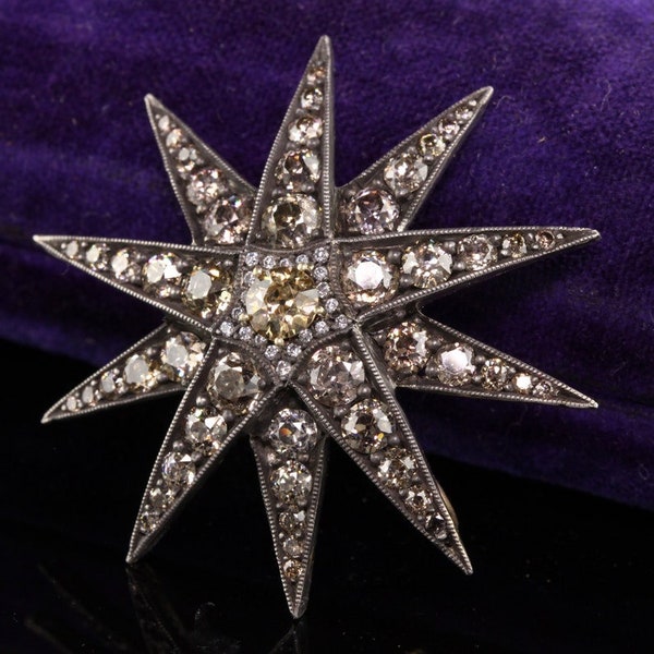 Antique Victorian 18K Yellow Gold Silver Top Old Mine Diamond Starburst Pendant is a stunning piece of jewelry that combines the elegance