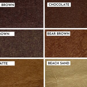 May include: Six fabric swatches in different shades of brown, from dark brown to light beige. The swatches are labeled "Dark Brown", "Chocolate", "Brown", "Bear Brown", "Latte", and "Beach Sand".