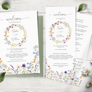 Può includere: Set di inviti di nozze con un design a corona di fiori. L'invito riporta i nomi "Sophie e William", la data e il luogo del matrimonio. Il programma include l'ordine degli eventi per la cerimonia e il ricevimento.