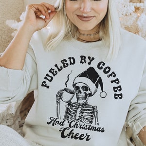 Fueled By Coffee & Christmas Cheer Svg Png, Christmas Coffee Png, Holiday Season Quotes, Coffee Lover Clipart, Christmas Skeleton Svg Vector