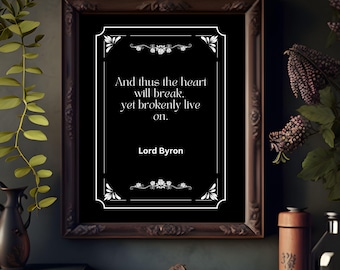 May include: Black and white framed print with a quote by Lord Byron: "And thus the heart will break, yet brokenly live on."