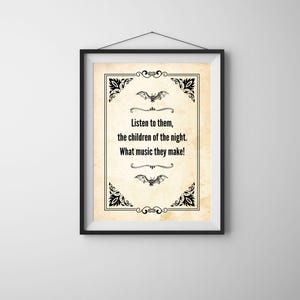 May include: Framed print with a vintage parchment background and black decorative borders. The print features the quote "Listen to them, the children of the night. What music they make!" along with bat illustrations.