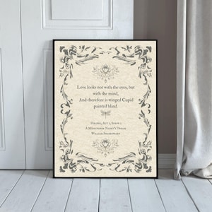 May include: A framed print featuring a quote from Shakespeare's "A Midsummer Night's Dream." The text, in a classic serif font, is surrounded by ornate floral and scrollwork borders. The background is a parchment color.