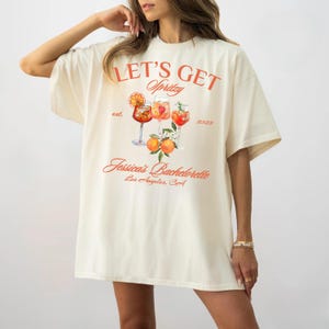 Let&#39;s Get Spritzy Bachelorette Shirt, Aperol Spritz Shirt, Aperol Club Shirt, Custom Girls Club Shirt, Spritz Cocktail Shirt