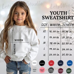 May include: A white youth sweatshirt with size and color options. The size chart shows measurements in inches, with widths ranging from 16.00 to 20.00 inches and lengths from 19.75 to 25.50 inches. Available colors include white, black, red, navy, and royal.