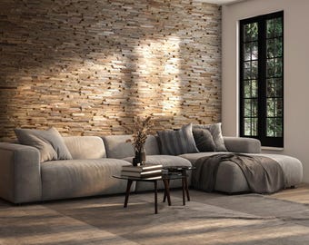 May include: A gray sectional sofa with a brown throw blanket sits in front of a wall made of stacked wood panels. The sofa is positioned in a living room with a large window behind it.