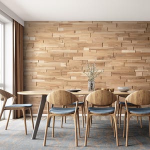 May include: A modern dining room with a wooden table and chairs. The wall behind the table is covered in wood paneling. There is a vase of flowers on the table.