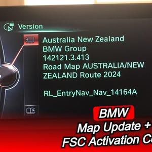 May include: A digital display shows BMW map update information. The screen displays "Australia New Zealand," "Road Map 2024," and other technical details. A red banner at the bottom reads "BMW Map Update + FSC Activation Code."