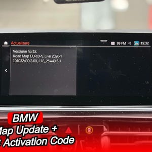 May include: A car dashboard screen displaying a map update. The screen shows "Road Map EUROPE Live 2026-1" and "BMW Map Update + FSC Activation Code". The screen also displays the time and radio frequency.