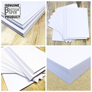 May include: A stack of white paper sheets with the text "GENUINE BRITISH PAPER PRODUCT" on the top sheet.