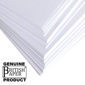 May include: A stack of white paper, with a logo that reads "GENUINE BRITISH PAPER PRODUCT" in black text.