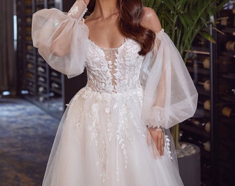 Tulle Ballgown with Dazzling Glitter Detail, Poetic Sleeves, and Delicate Embroidery Puff Sleeve bridal Dress with lace corset