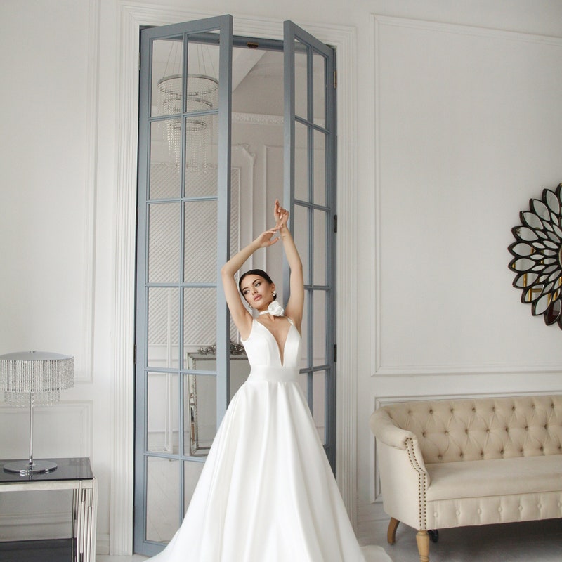 Satin A Line Elegant Plunging Neck Wedding Dress With Pocket main image 0