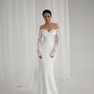 Elegant satin Off-Shoulder Lace Sleeve Bridal Gown with Classic Corset & Train. Open low back wedding delicate dress