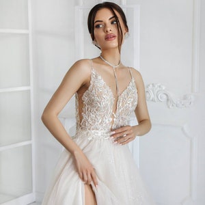 Glamour High-Slit white Wedding Dress with Beaded Lace Bodice and Sheer Tulle Overlay long skirt with train and Spaghetti Straps Deep V-Neck