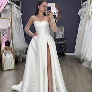 Exquisite Mikado Satin Wedding Dress with Pearls, Sweetheart Neckline, and Modest Sleeves | Custom, Sexy Princess Ball Gown for Bridal