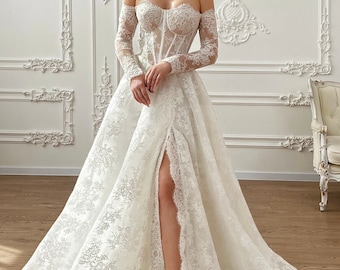 Elegantes weißes Off-Shoulder Brautkleid mit Zarter Spitze, Zeitloses Brautkleid mit Korsettrücken und langen Spitzenärmeln in A-Linie