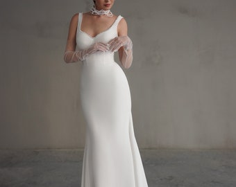White satin Elegant Sculpted Bodice Bridal Gown with Sheer Pearl-Embellished straps and Open-Back mermaid