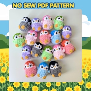 May include: A group of colourful, handmade crochet penguins in shades of pink, blue, green, purple, and grey. Each penguin has a yellow belly and is arranged on a white surface. The text "NO SEW PDF PATTERN" is displayed at the top.