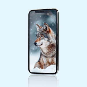 May include: A gray and brown wolf with a white chest sits in a snowy forest. The wolf is looking to the left of the image. The image is on a smartphone screen.