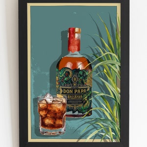 May include: A framed illustration of a bottle of Don Papa Masskara rum with a glass of rum and ice on a teal background with green palm leaves.