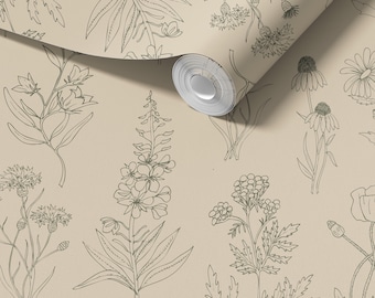 May include: A roll of wallpaper featuring a botanical design. The wallpaper has a beige background with detailed line drawings of various flowers and plants in a muted green color. The roll is partially unrolled, revealing the pattern.