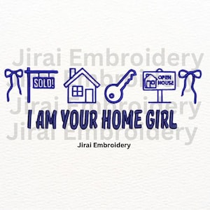 May include: A blue line art design with the text "I AM YOUR HOME GIRL". The design includes a house, key, and "Open House" sign. The word "SOLD!" is on a sign. The text "Jirai Embroidery" is also present.