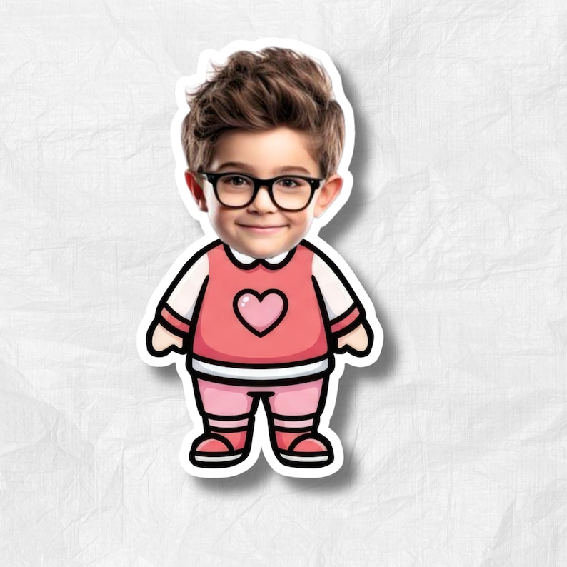 May include: A sticker featuring a cartoon illustration of a child wearing glasses, a pink top with a heart, and matching pants. The child has brown hair and is smiling. The sticker has a white border.