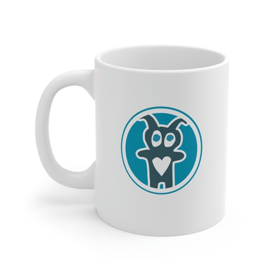 Warm-up with a nice cuppa out of this Creature logo ceramic coffee mug. It’s BPA and Lead-free, microwave & dishwasher-safe, and made of white, durable ceramic in 11-ounce size. A perfect gift for coffee, tea, and chocolate lovers.
.: White ceramic
.: 11 oz (0.33 l)
.: Rounded corners
.: C-handle
.: Lead and BPA-free