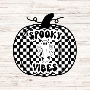 May include: A black and white pumpkin design with a checkered pattern. The pumpkin features the words "Spooky Vibes" and a ghost making a peace sign. The design is on a white wooden background.