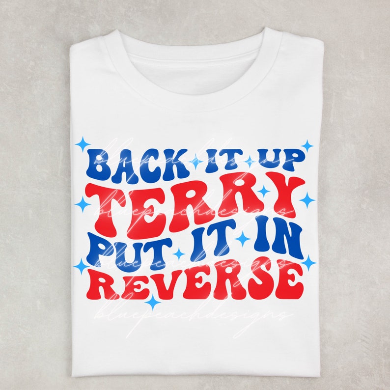 May include: White t-shirt with a red and blue graphic that says "Back it up Terry Put it in Reverse".