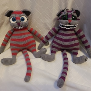 Ready to Ship from Wonderland comes the likeness of the Cheshire Cat Kitty *Choose Color Pink or Purple* 9&quot; (not including tail)