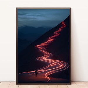Puede incluir: Una figura solitaria camina por un camino sinuoso en un paisaje montañoso. El camino está iluminado por largas rayas rojas de luz, creando un efecto surrealista y abstracto.