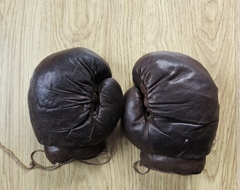 Antique straw filled Boxing gloves