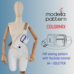 Op de afbeelding: Een wit naaipatroon voor een schoudertas met blauwe en witte stippen. Het patroon bevat een YouTube-tutorial en is beschikbaar in A4-formaat. Het patroon heet "ColorMix" en is van "Modella Pattern".