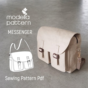 Peut inclure: Un sac messager beige avec un rabat, deux poches avant et des boucles marron foncé. L'image inclut le texte modella pattern MESSENGER Sewing Pattern Pdf et un dessin au trait noir et blanc illustrant le design du sac.