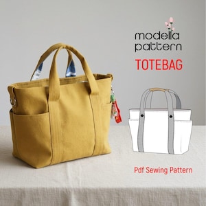 May include: A mustard yellow canvas tote bag with two handles, side pockets, and a metal D-ring. Next to it is a white line drawing illustration of the bag with the text modella pattern, TOTEBAG, and Pdf Sewing Pattern.